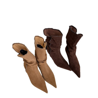 Pair of pointed-toe western boots in brown and dark brown suede with stitched trim