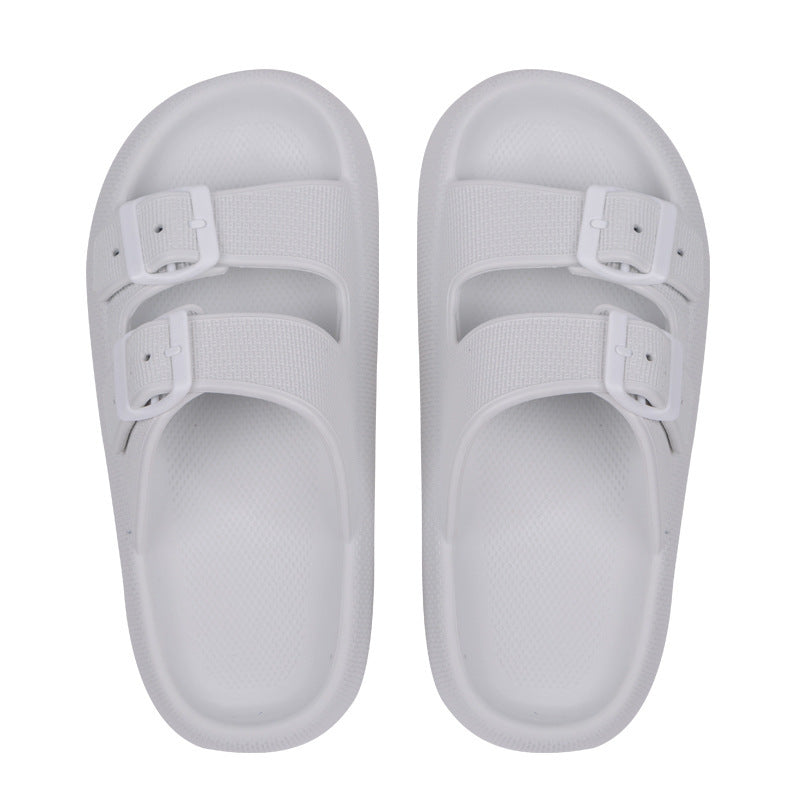 Top view of white thick-soled EVA slip-on sandals with two adjustable buckle straps