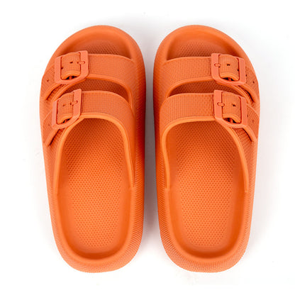 Top view of orange thick-soled EVA sandals with two adjustable buckled straps