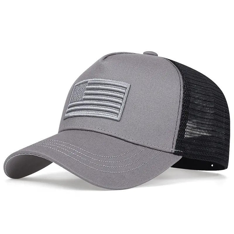 Gray baseball cap with black mesh back and embroidered American flag on front