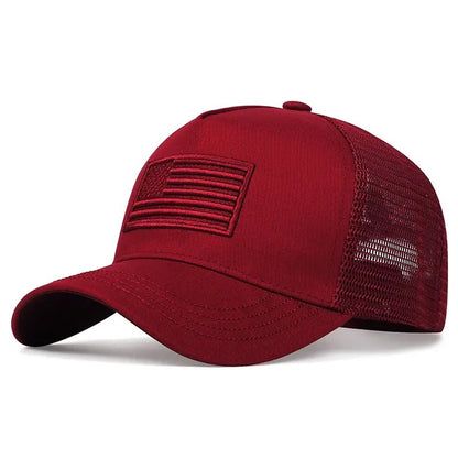 Red mesh baseball cap with embroidered American flag on front and curved brim