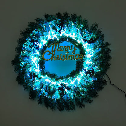 Glowing Christmas wreath with blue fiber optic lights and gold Merry Christmas sign