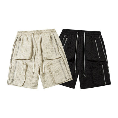 Men's loose workwear shorts in black and beige polyester cotton blend with multiple zipper pockets