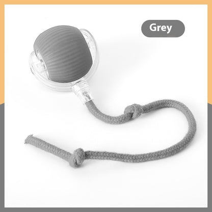 Grey interactive cat toy ball with soft textured surface and attached knotted rope for pet play