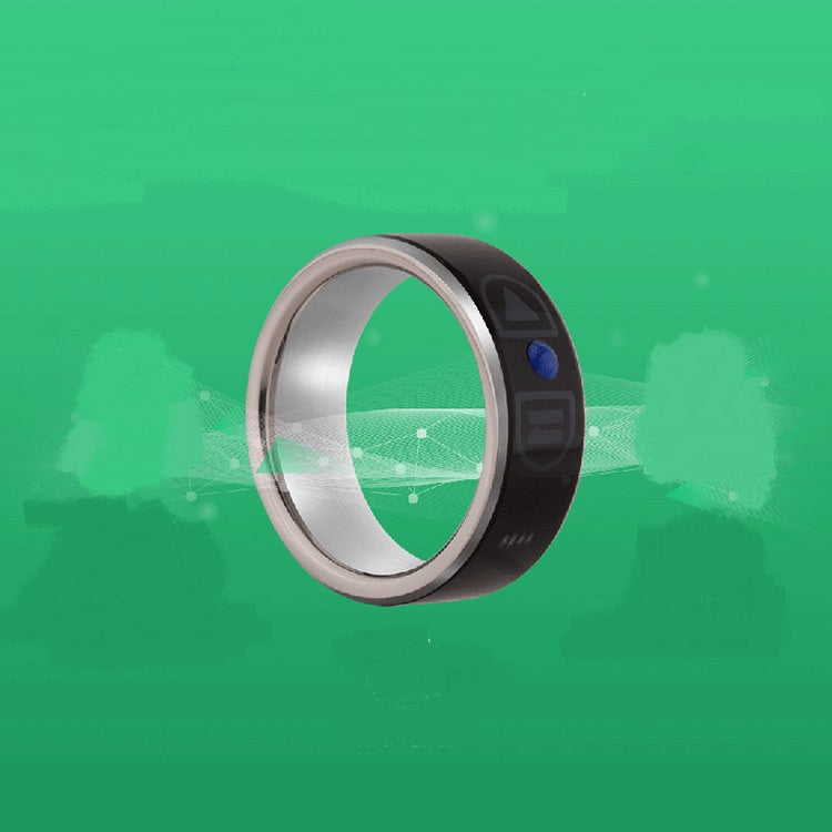 Trendoligy smart Bluetooth ring wearable device with black band and silver interior on green background