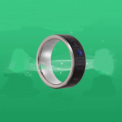 Trendoligy smart Bluetooth ring wearable device with black band and silver interior on green background