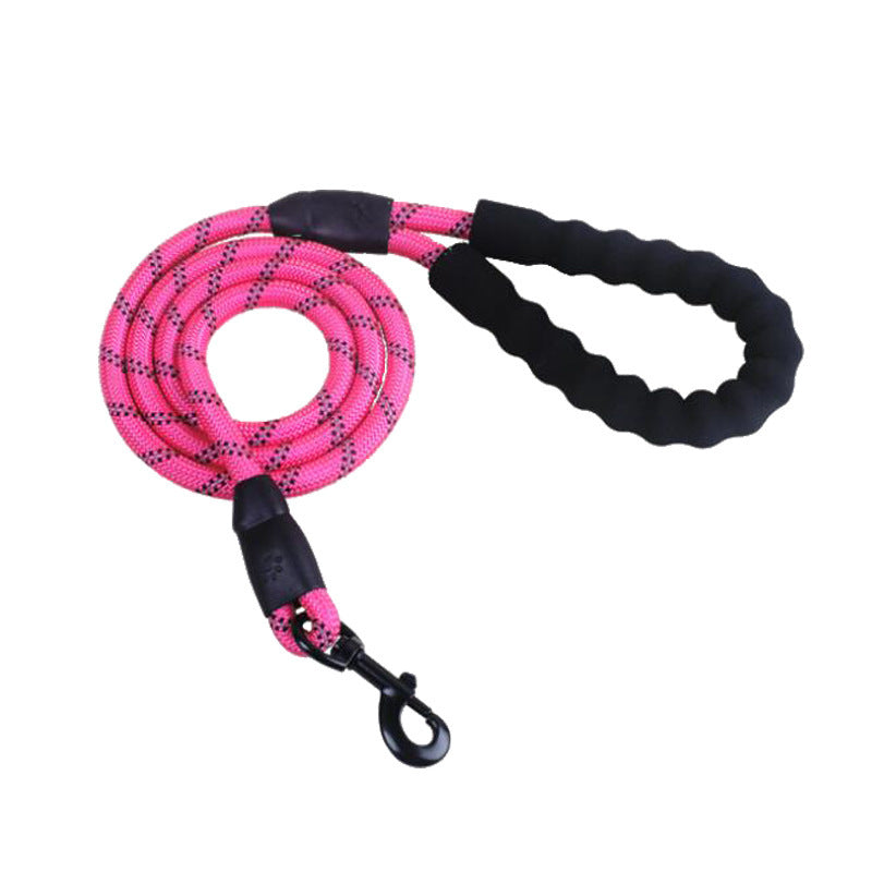 Pink reflective nylon dog leash with padded black handle and metal clip for secure pet walking
