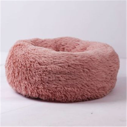 Pink 110cm plush round pet bed with soft, fluffy texture for cats and dogs