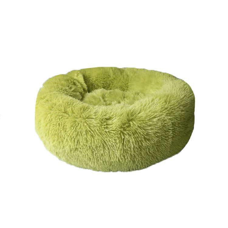 round fluffy lime green plush pet bed for cats and dogs on white background