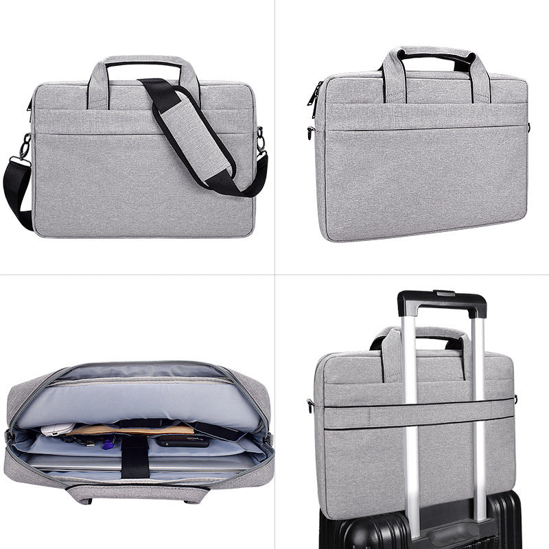 Gray 15.6-inch laptop briefcase with detachable shoulder strap, multiple compartments, and luggage strap