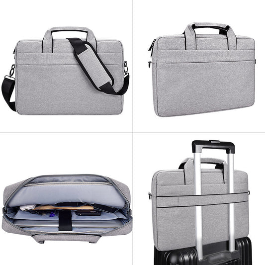 Gray 15.6-inch laptop briefcase with detachable shoulder strap, multiple compartments, and luggage strap