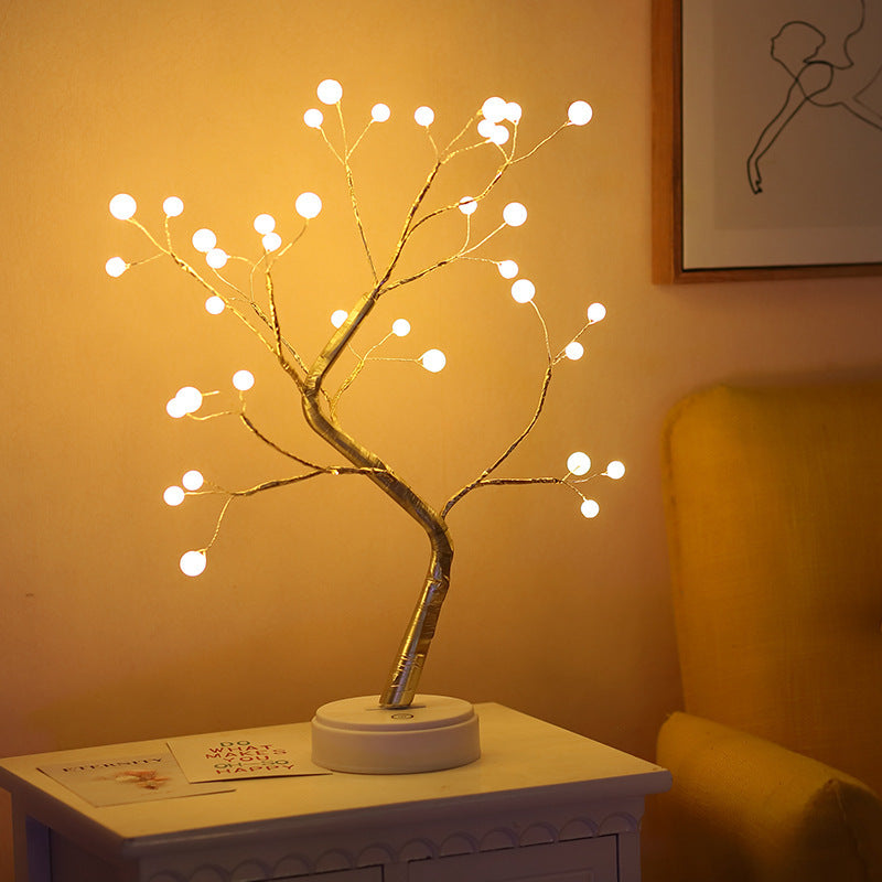 USB-powered bonsai tree lamp with 36 warm white LED pearl lights on white table