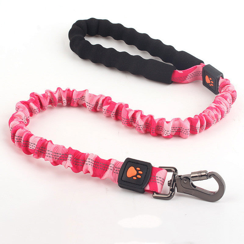 Pink short elastic dog leash with black padded handle and metal clip, paw print logo