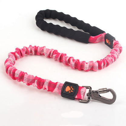 Pink short elastic dog leash with black padded handle and metal clip, paw print logo