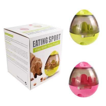 pink and green dog slow feeder treat ball toys with packaging box and dog image