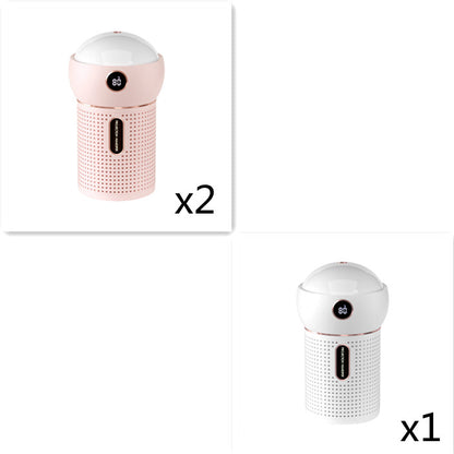 Compact USB humidifiers with star projectors in pink and white, showing digital display and mute feature