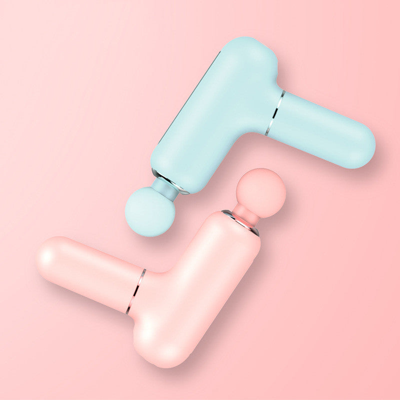 Two mini massage guns in pastel blue and pink on a soft pink background for deep tissue percussion