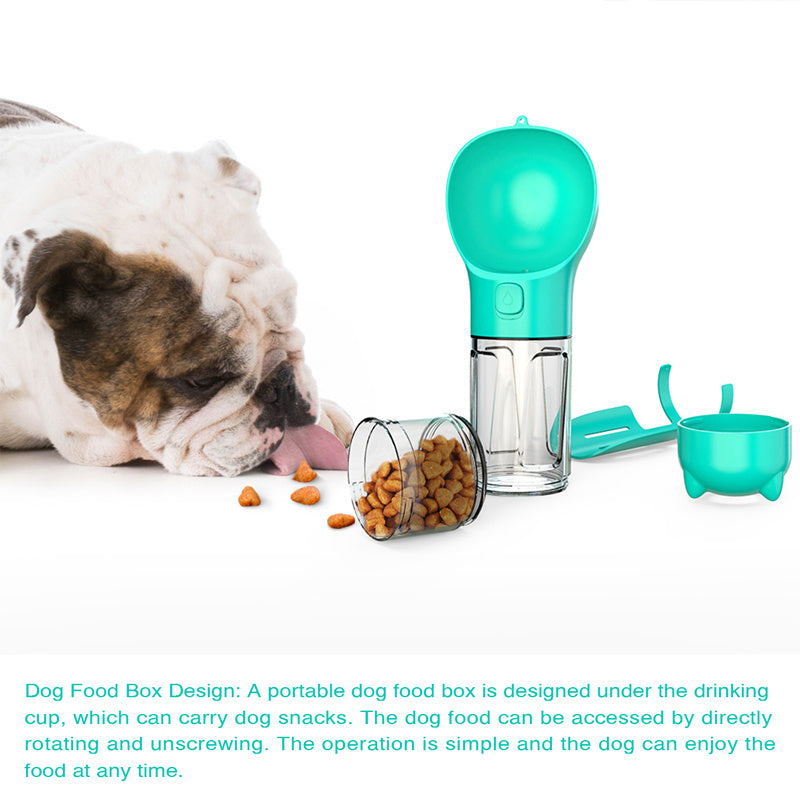Bulldog licking dog food scattered near portable 3-in-1 water bottle and feeder in turquoise