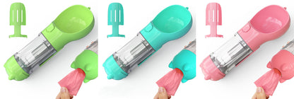 Portable 3-in-1 pet water bottle and feeder in green, blue, and pink with plastic scoops and waste bag dispenser