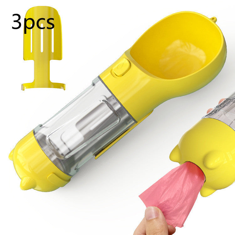 Yellow portable dog water bottle with attached dispenser and poop bags, 3-piece set on white background