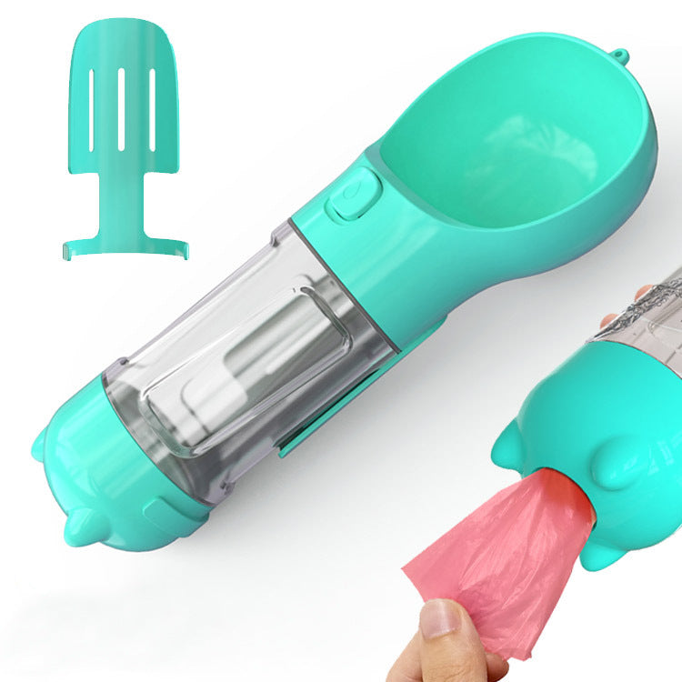 Portable turquoise 3-in-1 dog water bottle with attached feeding bowl and poop bag dispenser