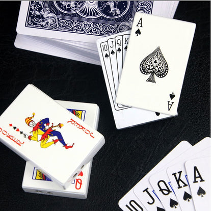 Creative poker card zinc alloy lighter shaped like Ace and Joker cards on black surface