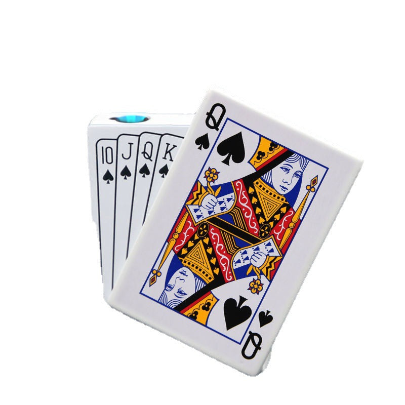 Zinc alloy lighter shaped like a Queen of Spades poker card with a flush hand of spades in the background