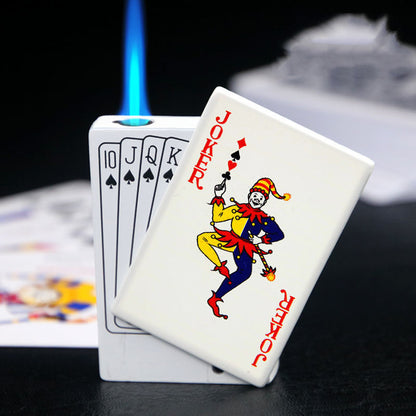 Poker card-themed zinc alloy lighter with Joker and royal flush design, blue flame ignited