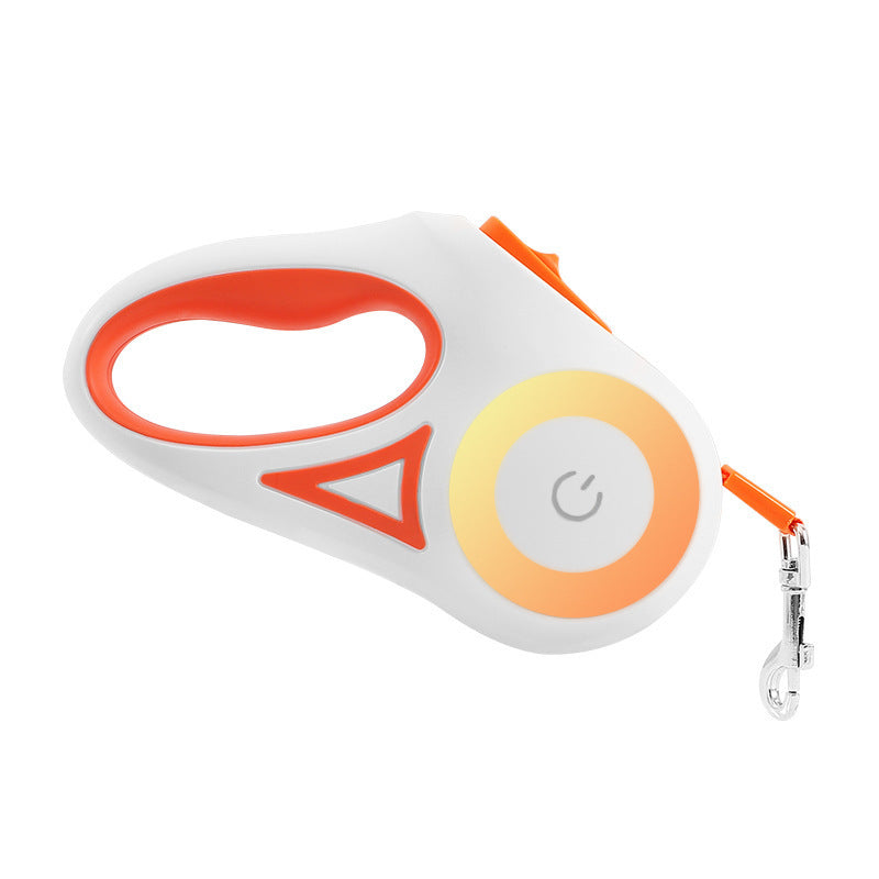 White and orange retractable dog leash with ergonomic handle and metal clip on white background