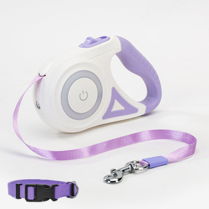 Purple and white retractable dog leash with ergonomic handle and matching purple pet collar on white background