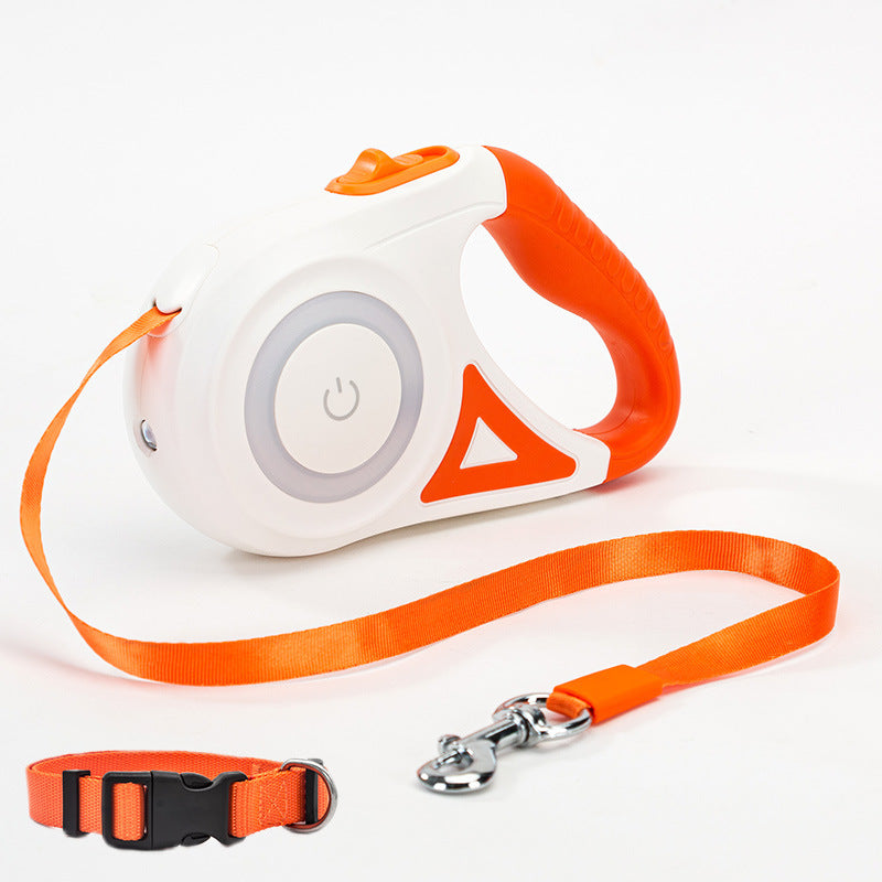 Orange and white retractable dog leash with ergonomic handle, 3m extendable traction rope, and matching orange collar