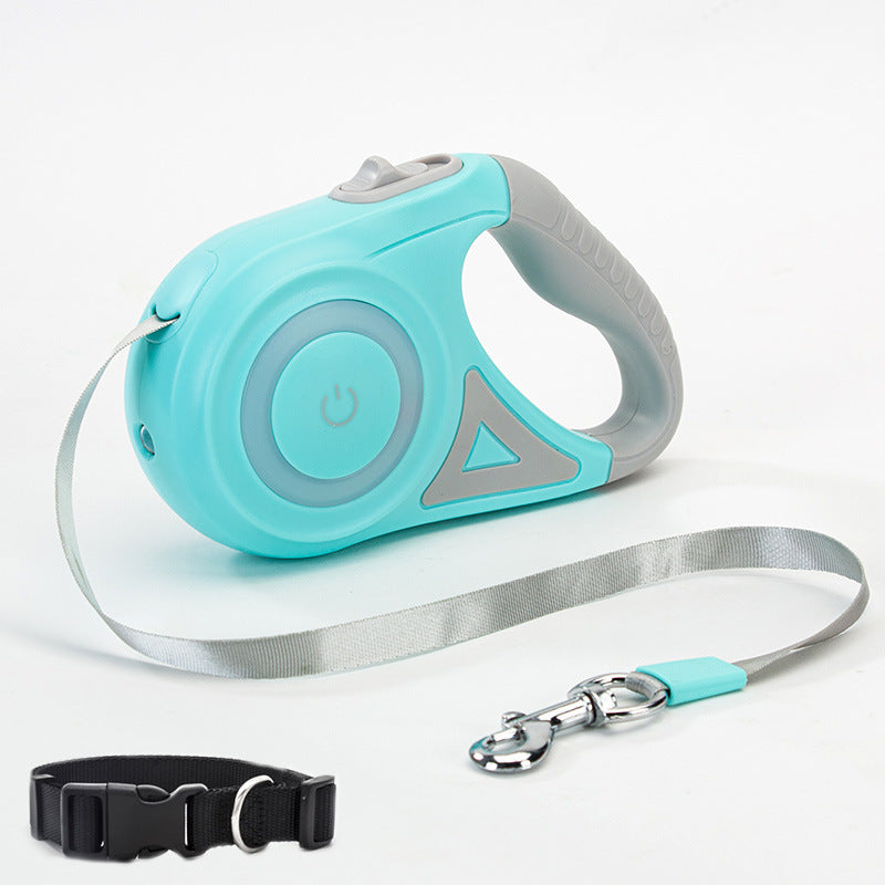Retractable turquoise and gray dog leash with ergonomic handle, silver tape leash, and black adjustable collar
