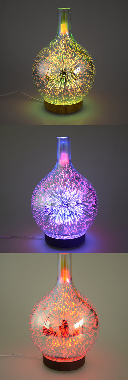 Three colorful 3D firework ultrasonic aroma diffusers with wooden bases on grey and beige backgrounds