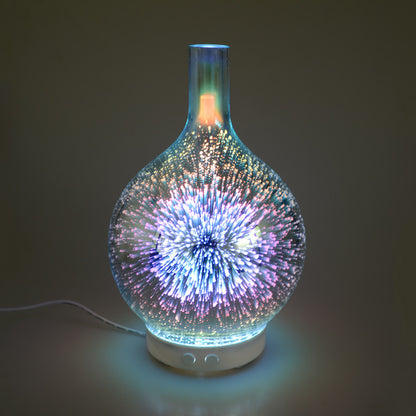 Glass ultrasonic diffuser with colorful 3D firework light display on white base