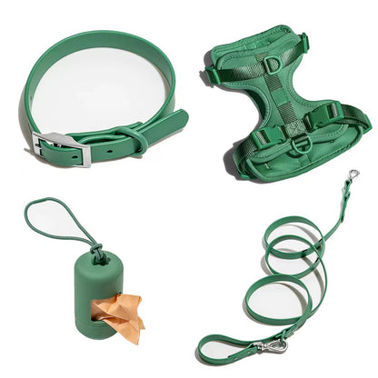 Green dog four-piece set including collar, harness, leash, and waste bag dispenser