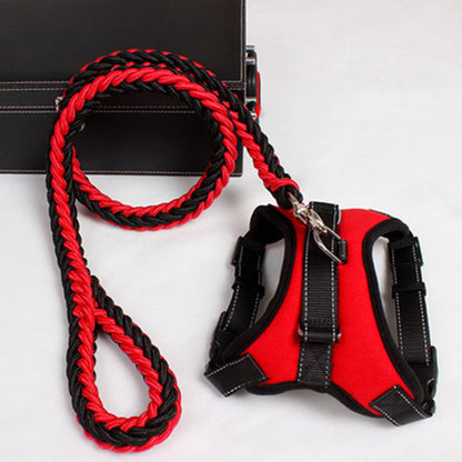 Red and black dog harness with adjustable straps and matching braided leash on white background