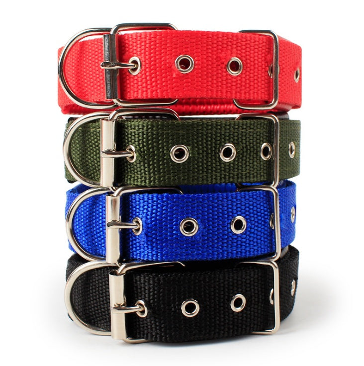 Stack of adjustable pet collars in red, green, blue, and black with metal buckles and eyelets