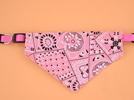 Pink polyester adjustable pet bandana with black and white paisley pattern on peach background