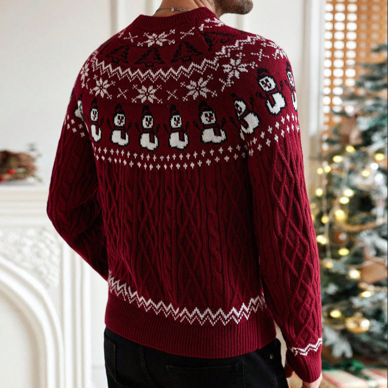 Back view of a man wearing a festive red cable knit Christmas sweater with snowflakes and snowman patterns