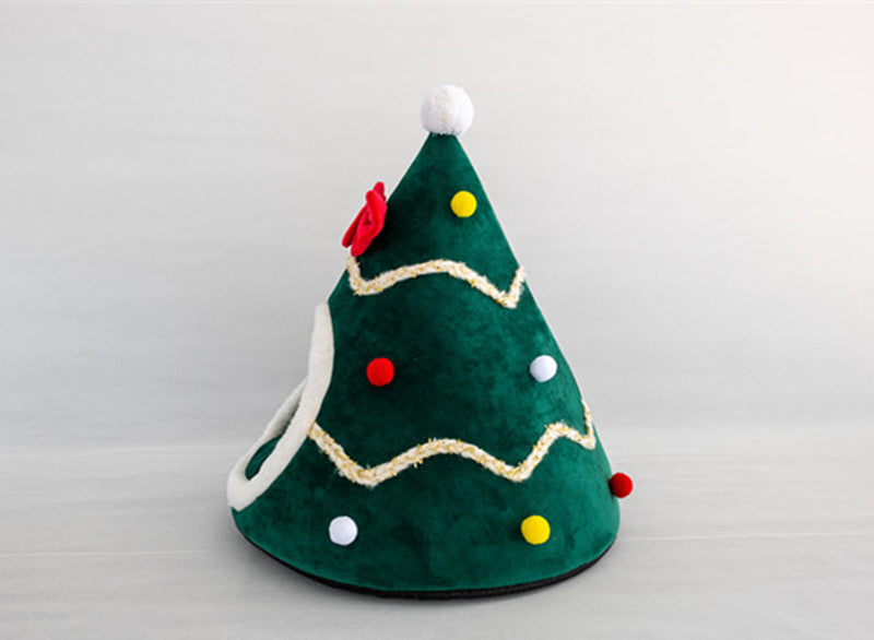 Cozy red and green Christmas tree shaped pet bed with colorful pom-poms and soft interior