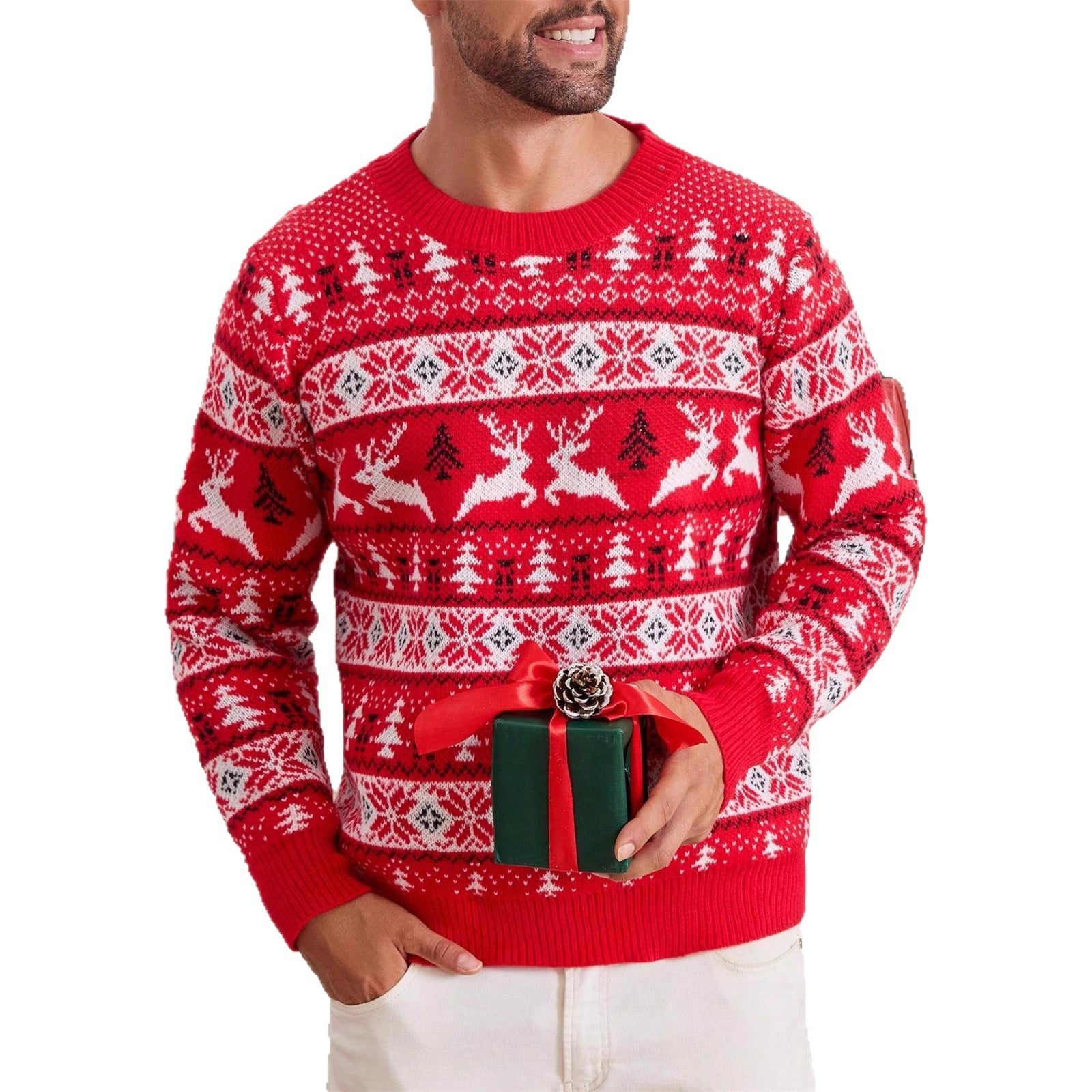 Man wearing red Christmas sweater with white reindeer and tree patterns holding green gift with red ribbon