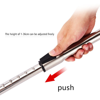 Hand adjusting the height of a stainless steel tool handle with push button and measurement slots