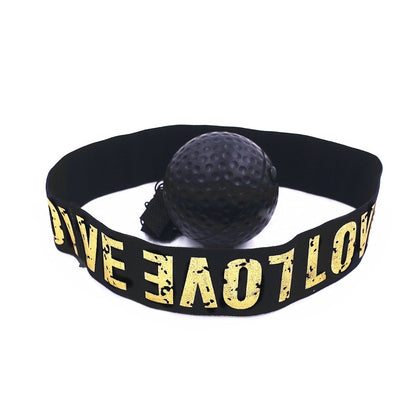 Black reflex punch ball with textured surface attached to elastic headband with yellow text on white background