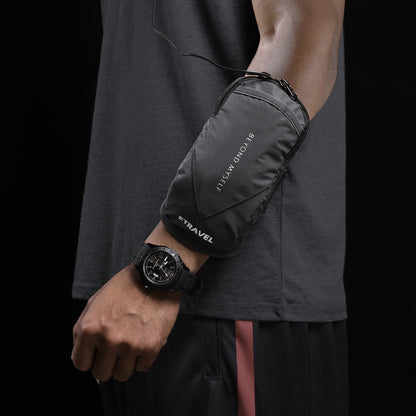 Black reflective arm bag with zipper and text beyond myself worn on man's arm, black watch visible