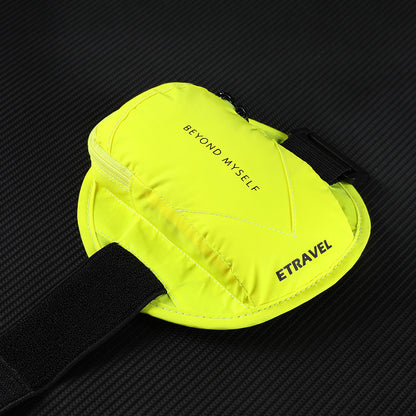 Neon yellow reflective running arm bag with black strap, labeled Beyond Myself and ETRAVEL