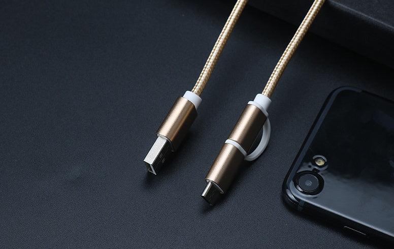 Rose gold braided 2-in-1 USB-C and micro USB fast charger cable with smartphone on black surface
