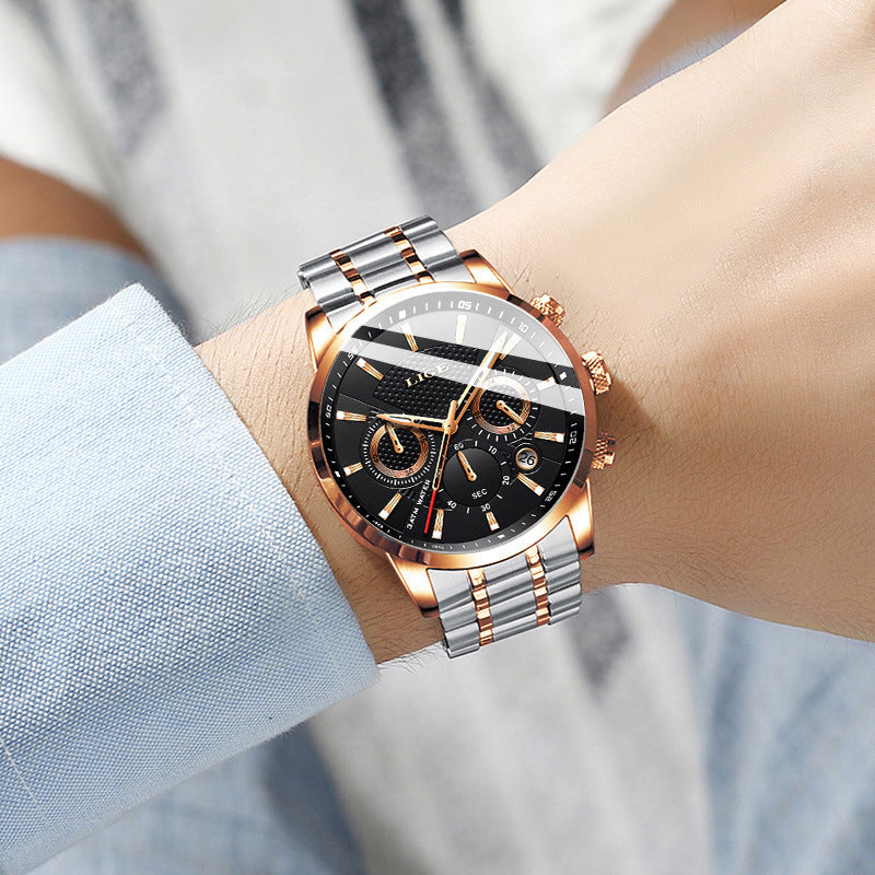 Men's luxury sports watch with black dial, rose gold accents, and silver stainless steel band on wrist
