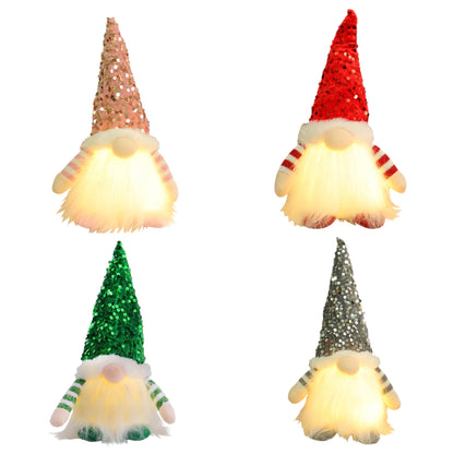 Set of four light-up Christmas gnome decorations with sequin hats in red, pink, green, and silver