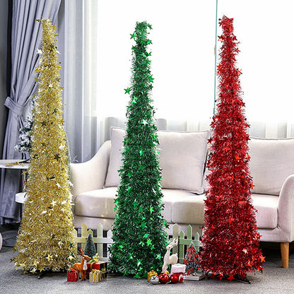 Gold, green, and red sequin folding Christmas trees with star decorations in living room setting
