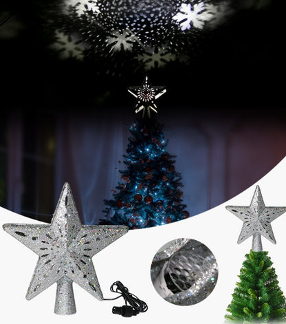 Silver glitter Christmas tree star topper with LED snowflake projector lights on tree